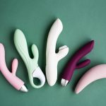 A set of toys for adults on a green background